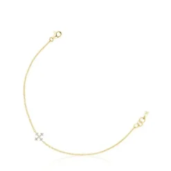 Pulseira cruz em ouro e diamantes Les Classiques
