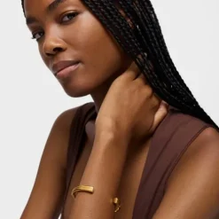 Pulseira escrava banhada a ouro de 18 K sobre prata e motivo coração com rodolitas TOUS 1950