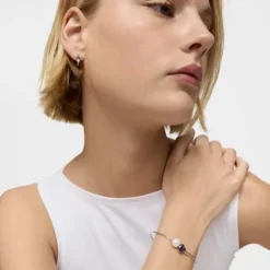 Pulseira escrava em ouro branco, iolita e pérola cultivada Ivette