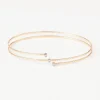 Pulseira espiral em ouro com três diamantes TOUS ATELIER