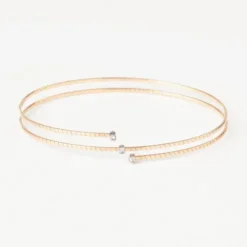 Pulseira espiral em ouro com três diamantes TOUS ATELIER