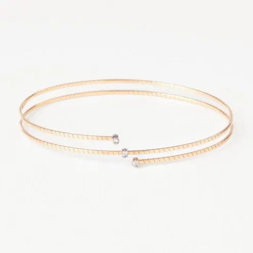 Pulseira espiral em ouro com três diamantes TOUS ATELIER