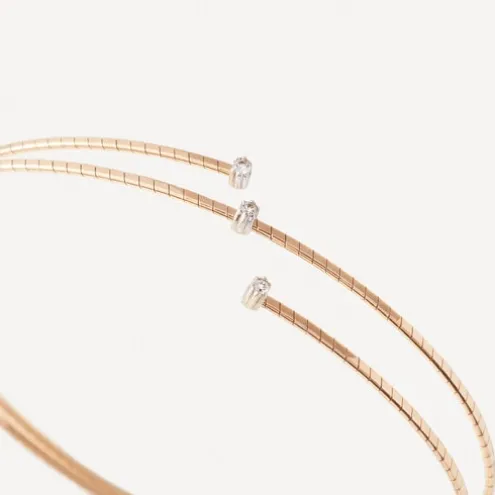 Pulseira espiral em ouro com três diamantes TOUS ATELIER